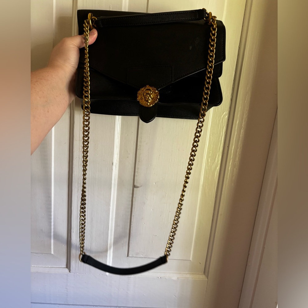 Gold and black lion purse Anne Klein like new